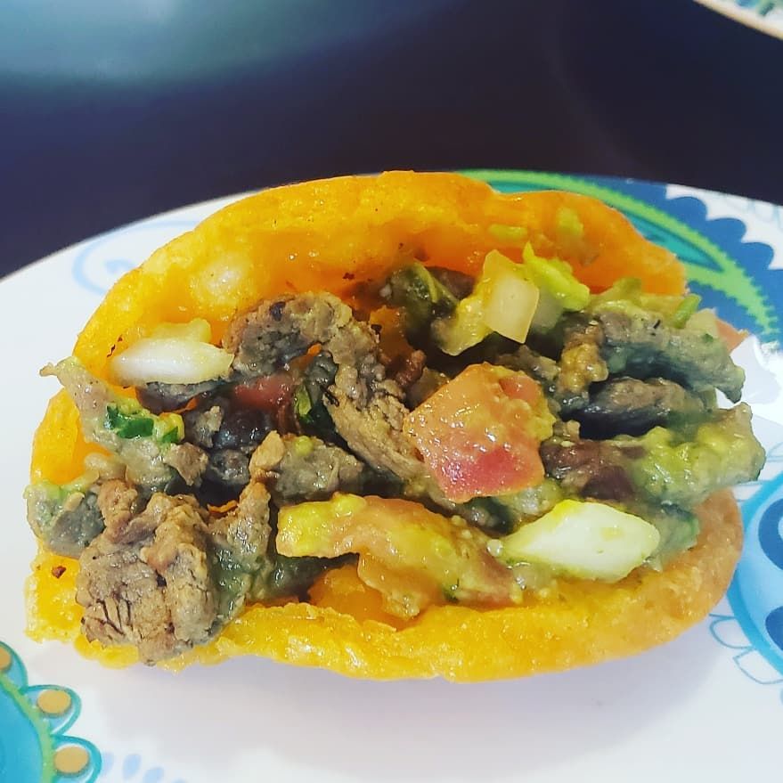 Dinner tonight carne asada tacos, got a burrito from the corner taco shop and used the meat in my waffle taco shell, a