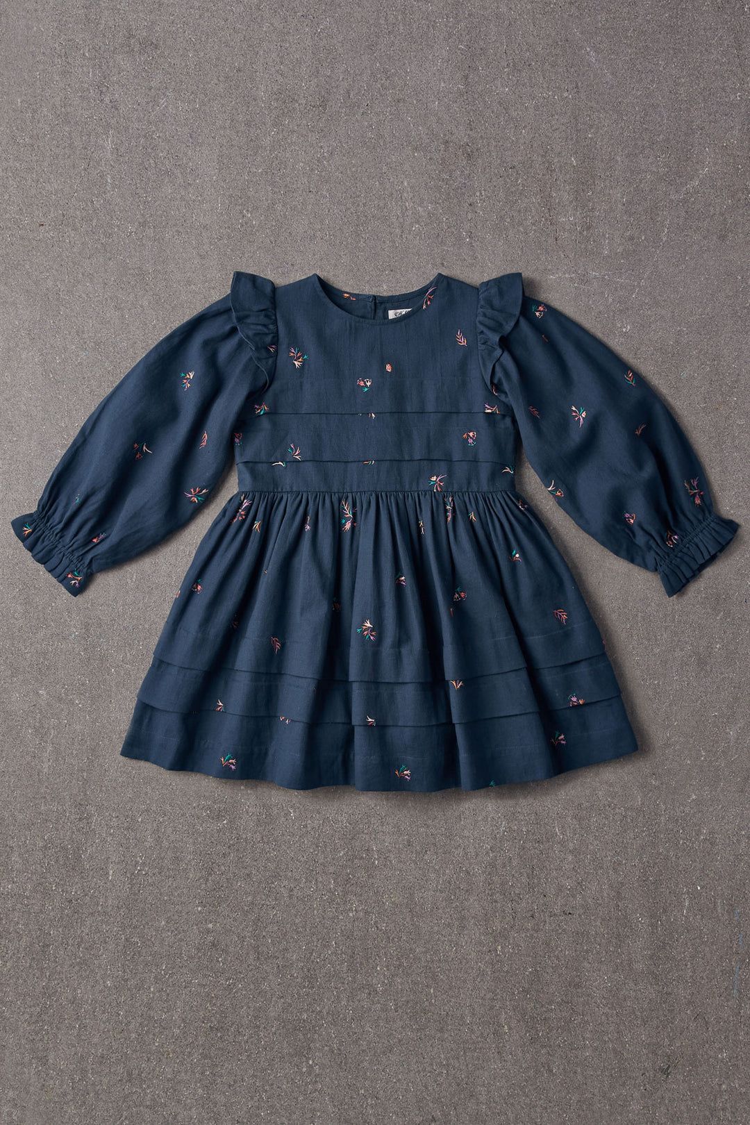 The Liesl Baby Girls Dress by Nellystella is a classic style dress featuring long, puffed sleeves, tiers at the bodice and around the skirt, and cute ruffles at the shoulders. 100% cotton. Baby Cotton Dress, Cotton Frocks For Kids, Girls Cotton Dresses, Baby Clothes Girl Dresses, Little Girl Dresses, New Baby Dress, Cute Baby Dresses, Baby Outfits, Dress Outfits