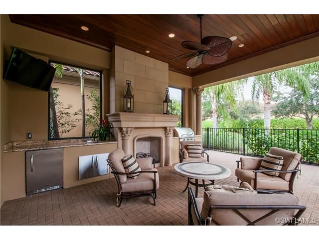 Covered Lanai Wood Ceiling Fireplace And Summer Kitchen Grey Covered Lanai Wood Ceiling Fireplace And Summer Kitchen Grey Oaks In Naples Fl