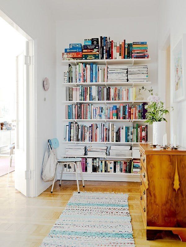 Small E Secrets Swap Out Your Bookcases For Wall Mounted E Saver Swap Out Bookcases For Built In Shelving Apartment Therapy