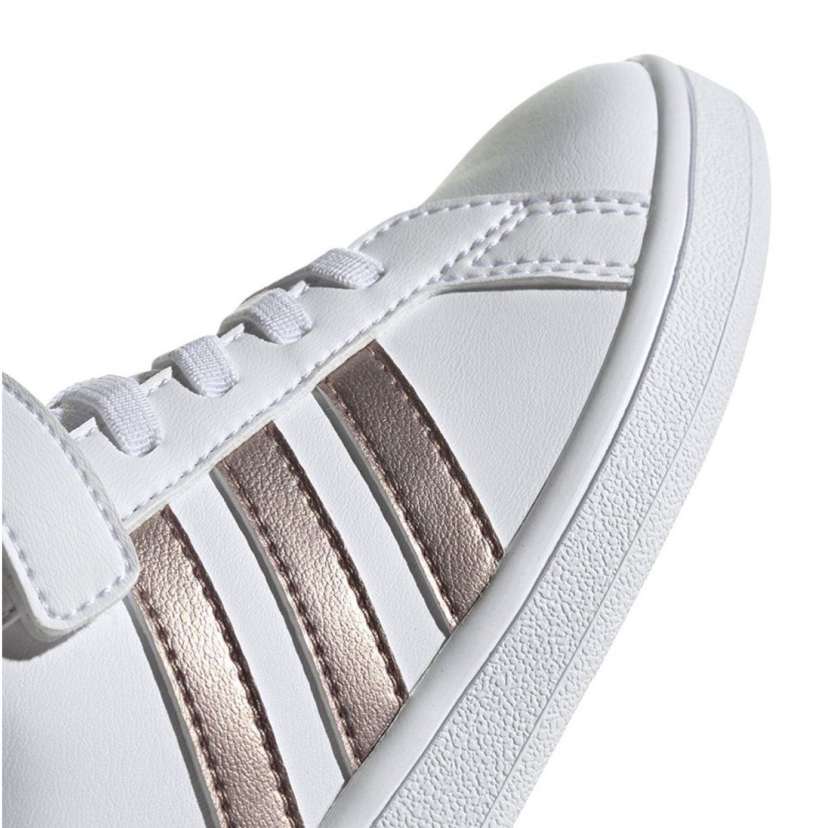 white adidas school shoes