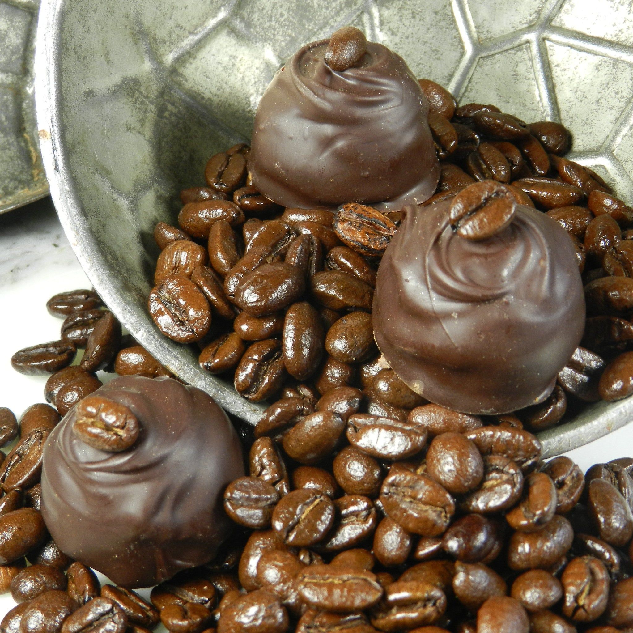 Introducing Espresso Chocolate Truffles from Napa Valley Chocolate Company. Blended with our dark chocolate ganache the finely ground dark roasted coffee beans combine to create this chocolate and espresso lover’s artisan Chocolate Truffle. At Napa Valley Chocolate Company, we make all our Espresso Chocolate Truffles in small batches to ensure that you receive the highest quality, freshest Chocolate Truffles possible. For our delicious Espresso Chocolate Truffles, we carefully blend finely groun Rich Dark Chocolate, Chocolate Espresso, Artisan Chocolate, Chocolate Cinnamon, Chocolate Ganache, Mint Chocolate, Chocolate Peanut Butter, Espresso Beans, Belgian Chocolate