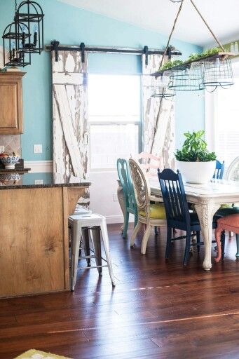 Barn Doors Around Window Wire Baskets As Light Fixture