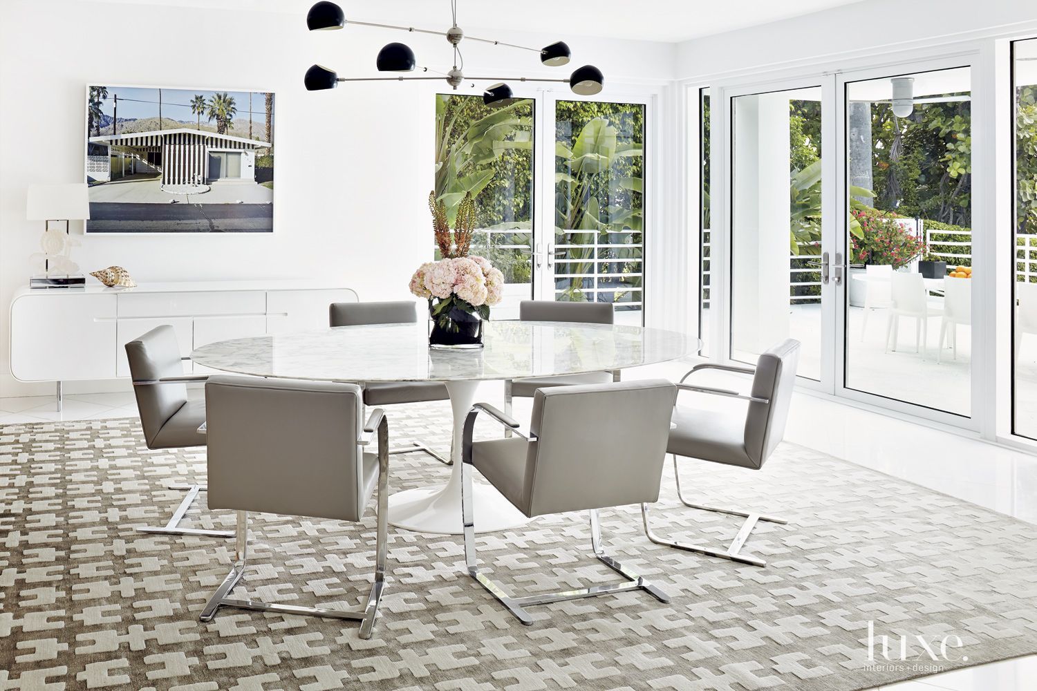 Modern White Dining Room With Textured Area Rug Luxe Dining Prepossessing Dining Room Area Rug Decorating Inspiration Modern White Dining Room With Textured Area Rug Luxe Dining Magnificent Dining Room Area Rug Inspiration Design