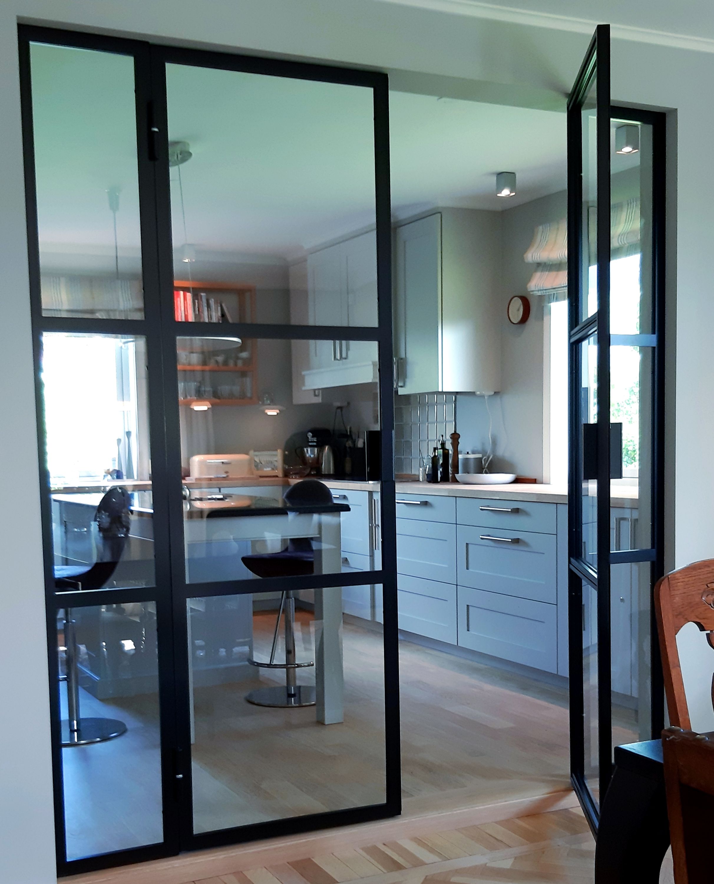 Double french doors with fixed sidefields installed in happy…