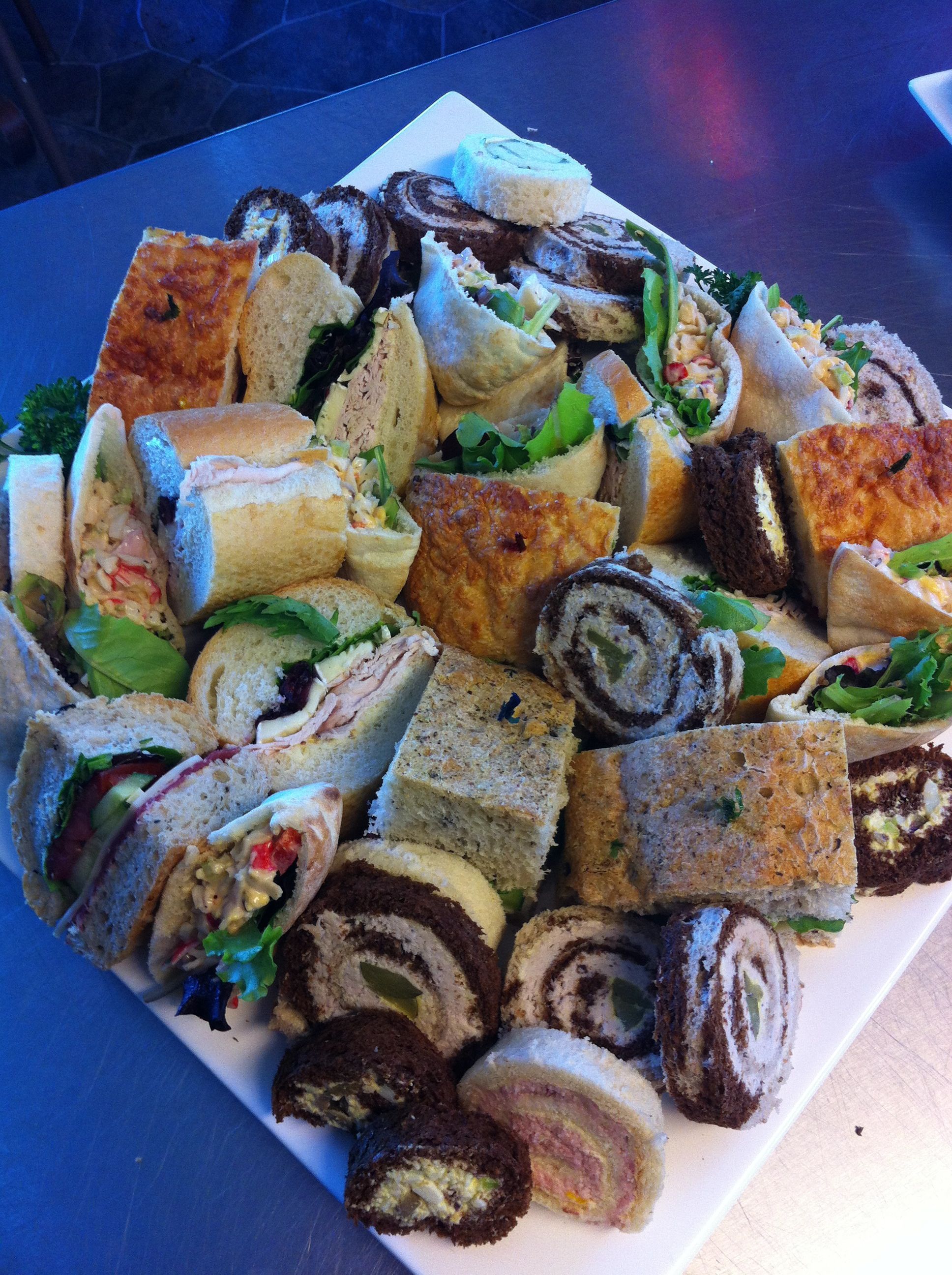 Fancy finger sandwich platter by Fried Green Tomatoes Catering | Finger