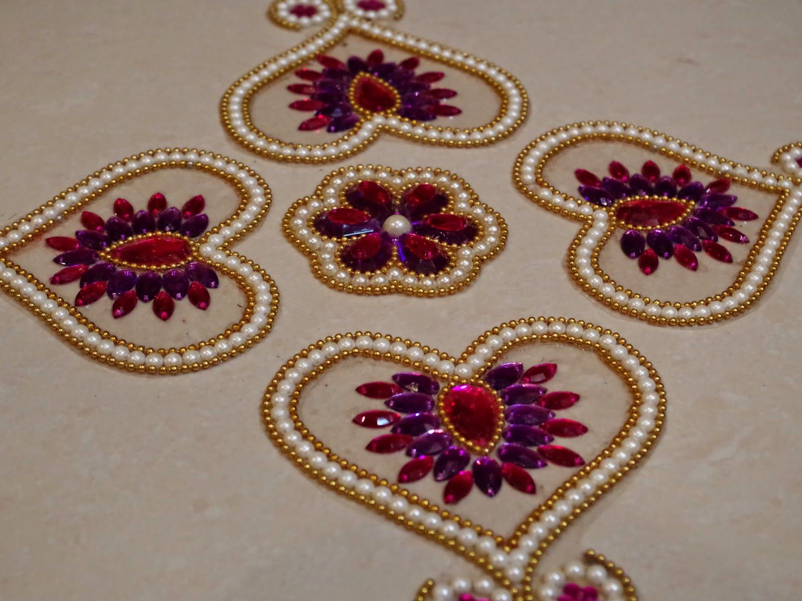 Online New floating rangoli design with kundan work Prices