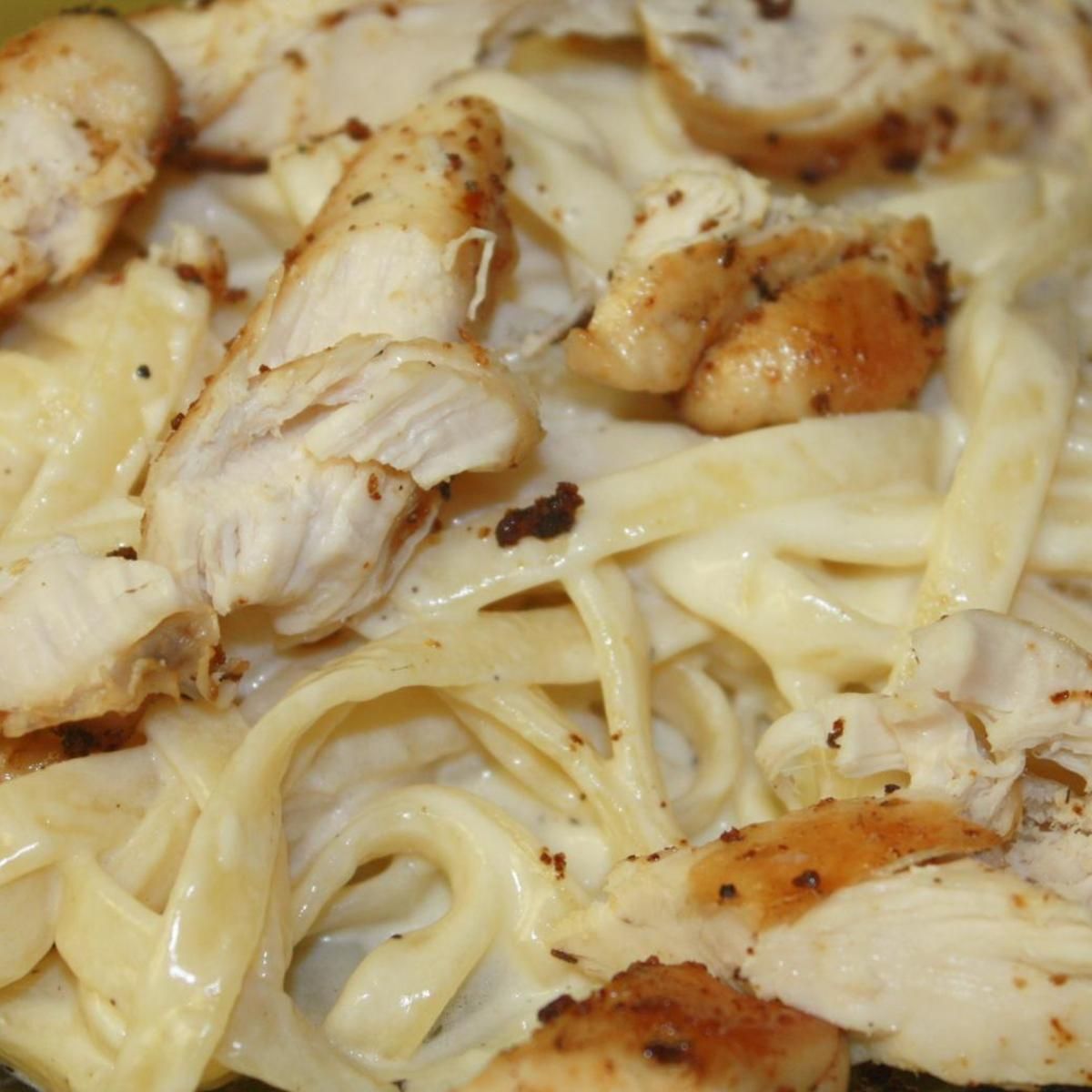 How to butterfly a chicken breast: Chicken parmesan casserole. A family favorite that is super easy to make. This real food, healthy dinner recipe is also freezer friendly.