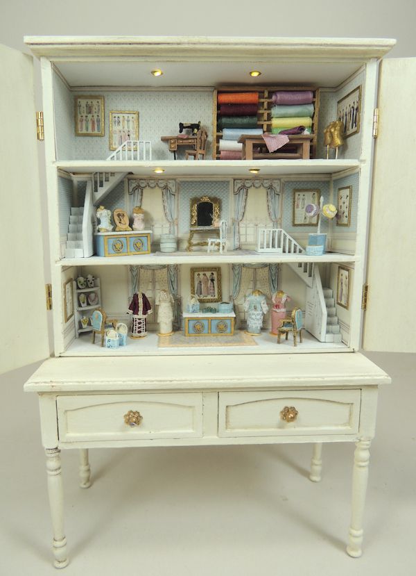 When open, the cabinet reveals a darling baby house scale French Dressmaker's Salon. Miniature Rooms, Miniature Diy, Miniature Houses, Miniature Furniture, Dollhouse Miniatures Diy, Dollhouse Kits, Dollhouse Cabinet, Dollhouse Tutorials, Repurposed Furniture