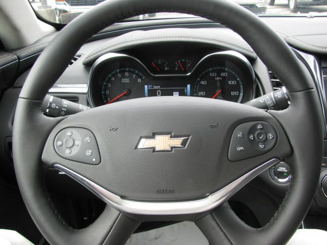 Leather Wrapped Heated Steering Wheel with Cruise and Audio Controls