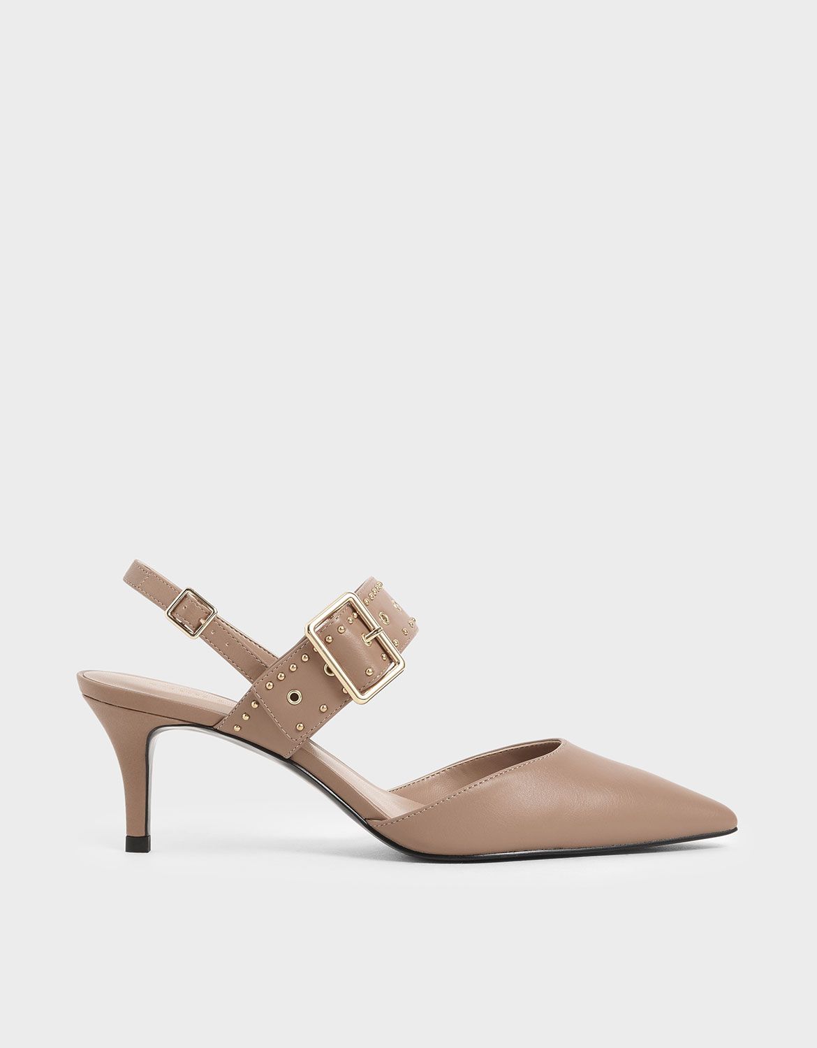 Studded for an edgy touch, these nude slingbacks go with practically everything. The mid stiletto heel promises a leg-lengthening effect, while the fierce pointy-toe gives it an almost timeless feel. Show them off with short hemlines -- we suggest pleated skirts and culottes. Slingback Heel, Slingbacks, Faux Leather Heels, Charles Keith, Court Shoes, Buy Shoes, Metal Buckles, Pointy Toe, Belt Size