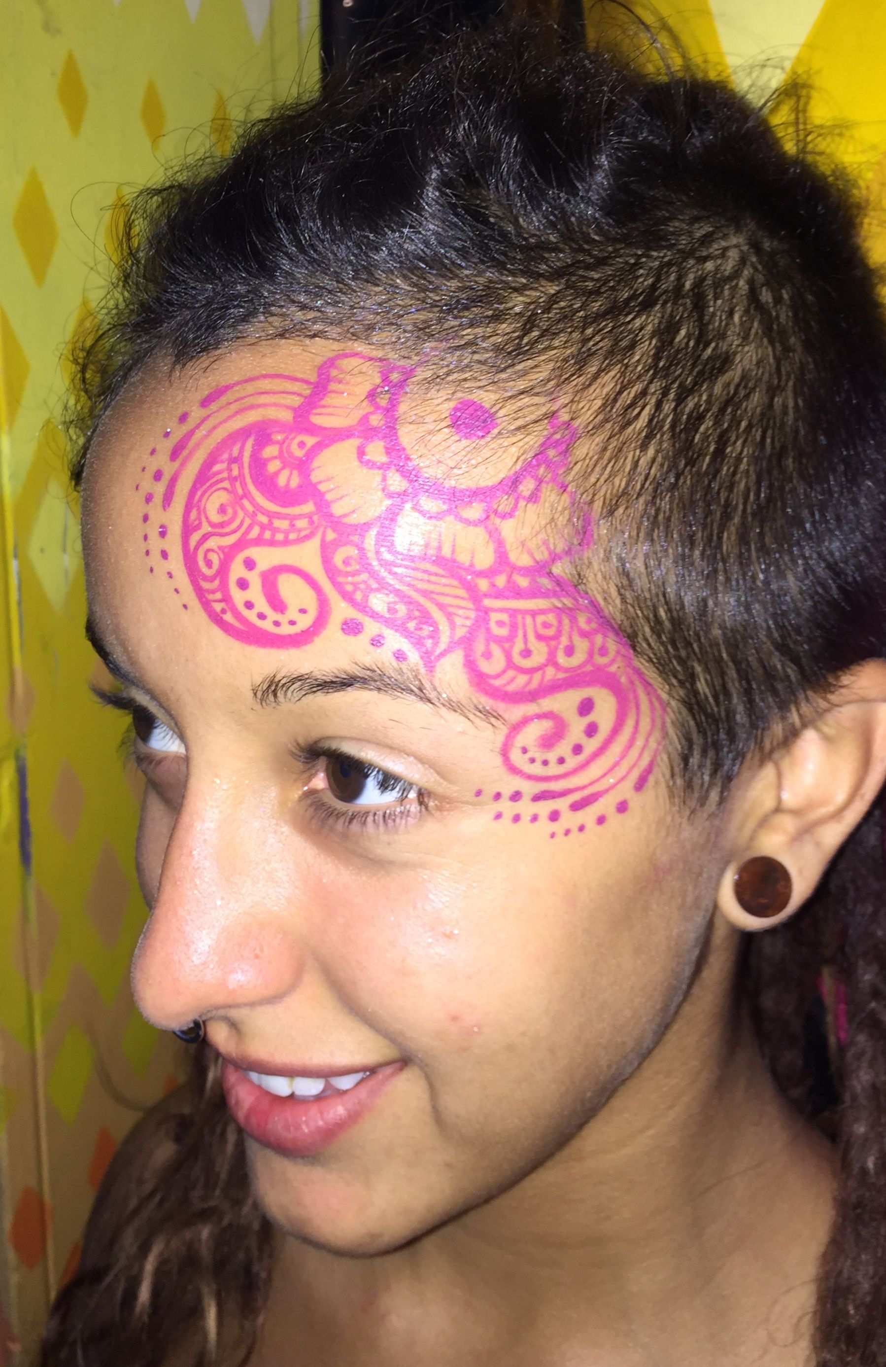red henna inspired face paint by cynnamon of bay area party ent in