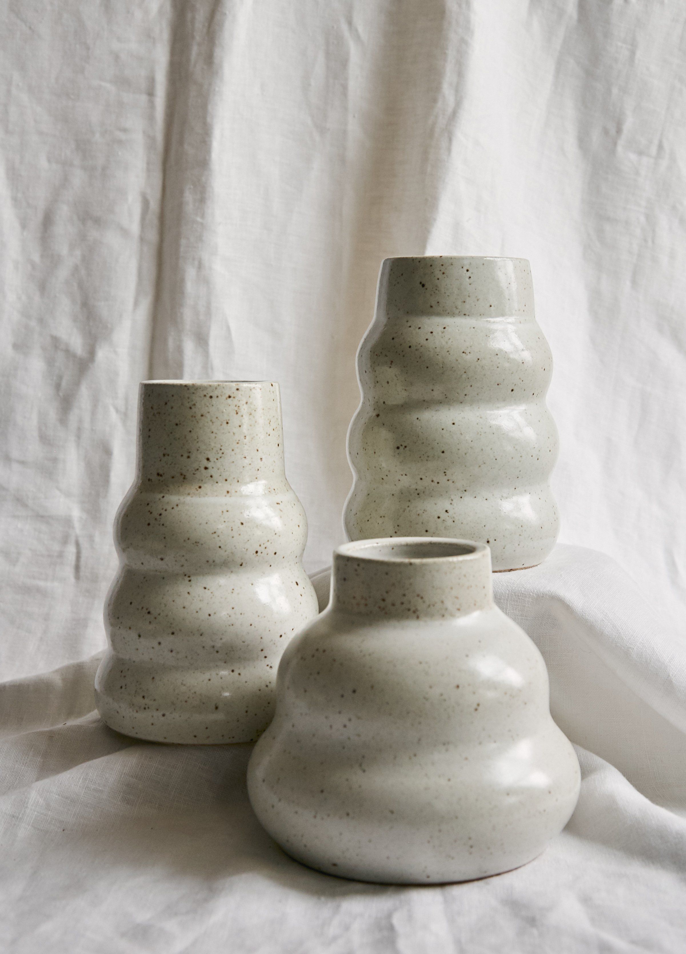 BX Ceramics are ceramics made by Becki Chernoff in Los Angeles, California. Becki has been wheel throwing since 1994. She is currently a member of Xiem Clay Center in Pasadena where she teaches beginning wheel throwing and is the teaching assistant for an Art Center intro to Ceramics class. With a background in Automotive Engineering, industrial geometry informs the clean lines in her work. Becki is also a Car Hunter and Hand Model. These amazing Bubble Vases resemble a gord found in nature. The Ceramics Pottery Vase, Pottery Sculpture, Clay Ceramics, Pottery Bowls, Ceramic Sculptures, Clay Vase, Handmade Ceramics Vase, Unique Ceramics, Modern Ceramics