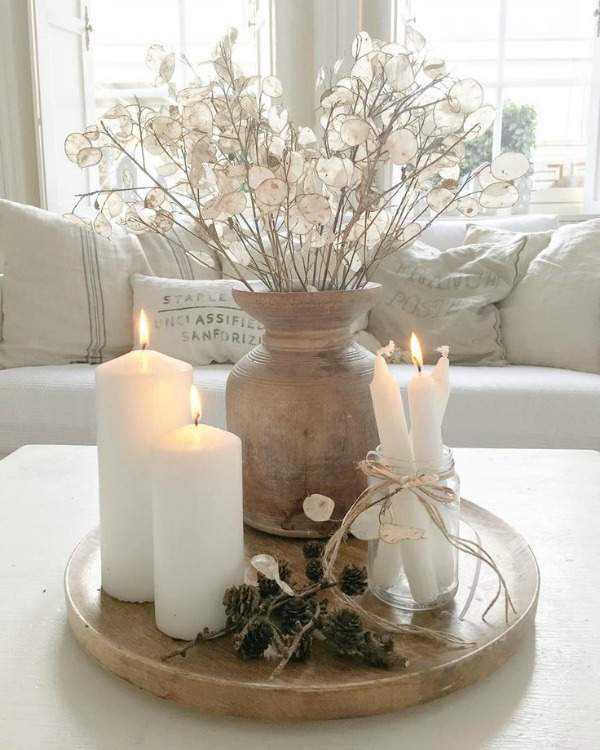 Serene and spare all white Scandi style living room with Mora clock - Villa Jenal. #frenchnordicstyle #nordicfrench #livingroom #swedishdecor #moraclock #interiordesign Coffee Table Styling, Decorating Coffee Tables, Coffee Table Centerpieces, Dining Table Decorations, Candle Arrangements Living Room, Living Room Decorations, Decorating Ideas For The Home Living Room, Home Decorations, Winter Decor Ideas For The Home