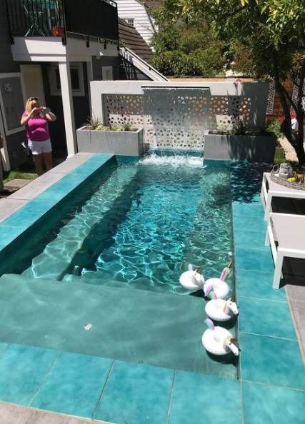inground pool with concrete patio