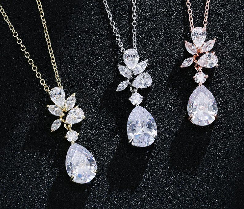 Wedding CZ Necklace Jewelry Set, Bridal CZ Necklace Jewelry Set, Bridesmaid Jewelry Set Material : Cubic Zirconia. Plating : Platinum. Pendant Shape : Pear. Suitable for : Female. Style : Wedding. Usage : Decoration. Color : Silver. Length : 45cm. Clear Teardrop CZ Pearl Jewelry Set Bridesmaid Gifts Bridal Earrings Necklace Silver Wedding Bridesmaid Necklace Bridesmaid Earring Cubic zirconia versus diamond: There are a few key features of cubic zirconia which distinguish it from di Bridesmaid Jewelry Sets, Bridesmaid Necklace, Bridesmaid Gifts, Wedding Necklace Set, Wedding Jewelry Sets, Rose Gold Earrings, Bridal Earrings, Silver Necklaces, Jewelry Necklaces