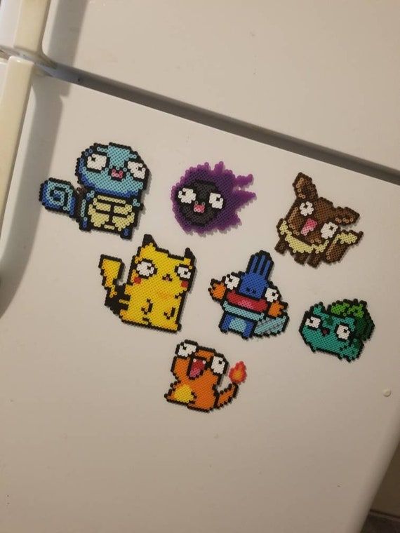 Complete your refrigerator with a little pearlier bead nostalgia with these derpy Pokemon magnets. Fully loaded with a lot of humor and personality. Theyre between 3-6 fairly large magnets, handmade from melty beads. Each one is made to order. For the month of February we will have a limited supply Diy Perler Bead Crafts, Perler Bead Templates, Pearler Bead Patterns, Diy Perler Beads, Perler Bead Art, Perler Patterns, Hama Beads Design, 3d Pokemon, Pokemon Bead