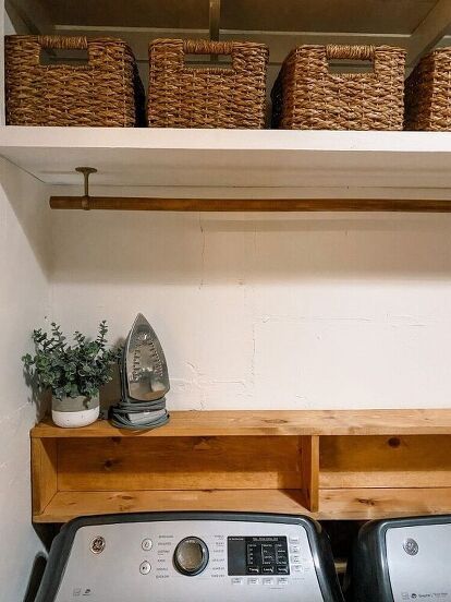 CLICK HERE TO SUBSCRIBE FOR WEEKLY DIY UPDATESThe idea for this DIY laundry shelf was to hide the plywood in the back of the washer and dryer, plus give a home to the detergent etc. so we wouldn’t need to climb up to the big cabinet each time we do a load of laundry.This project was so easy and it was done in an afternoon, including staining. It’s a really easy beginner project and a good way to use up some wood if you’ve got a few pieces hanging around.You can read more about this pr… Laundry Nook, Laundry Cabinets, Laundry Room Shelves, Diy Laundry, Low Shelves, Open Shelving, Floating Shelves, Shelf, Ceiling Curtain Rod