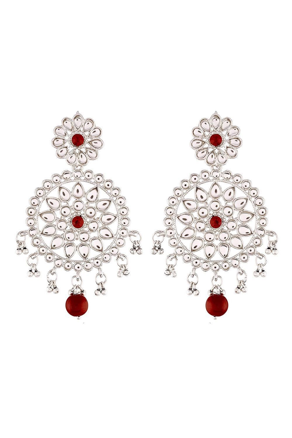 This earring set is crafted in gold plated finish with stunning antique finish - these earrings are really special .The earrings feature kundan-studded. Be stylish and smart with these golden earring. Perfectly crafted. Wear it with a suit or a saree, and lehenga for an ethnic yet classy look. This earring set is a great option and a perfect pick for your wedding functions. Be assured to find a variety of contemporary and traditional designs in the mesmerizing collection that we offer Product Fe Large Dangle Earrings, Golden Earrings, Lehenga, Saree, Wedding Function, Antique Finish, Online Earrings, How To Look Classy, Kundan