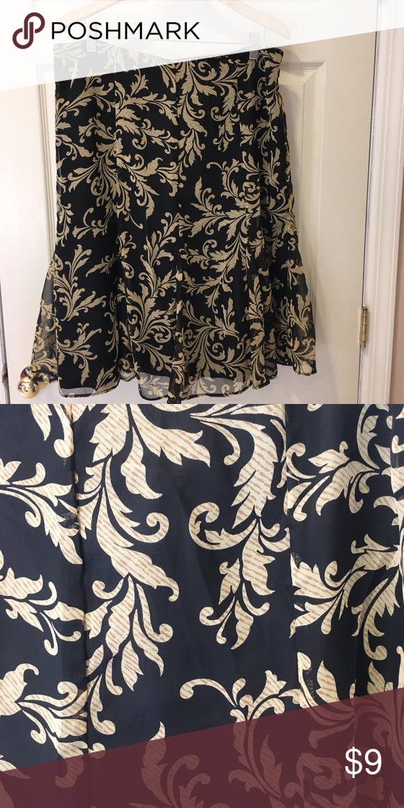 Black and Tan or gold Scroll skirt Tan / gold scrolls and black. Light