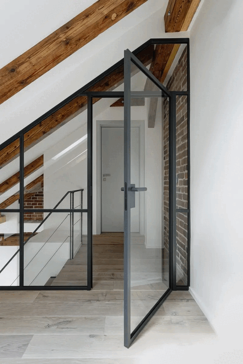 Industrial interior doors in combination with a fixed partition