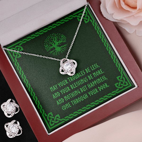 May your troubles be less, and your blessings be more. And nothing but happiness, come through your door. Each beautiful Knot is crafted with brilliant 14k white gold over stainless steel, surrounding a dazzling 6mm cubic zirconia crystal, and further accented with even more CZ's, showcasing added sparkle and shine to this gorgeous gift. You must see it for yourself! Necklace Details:.: 14k white gold over stainless steel.: 6mm round-cut cubic zirconia stone.: 18"-22" adjustable cable chain neck Crown Necklace, Mom Necklace, Necklace Earring Set, Etsy Earrings, Celtic Knot Earrings, Mens Chain Necklace, Hot Gifts, Gorgeous Gift, Beautiful