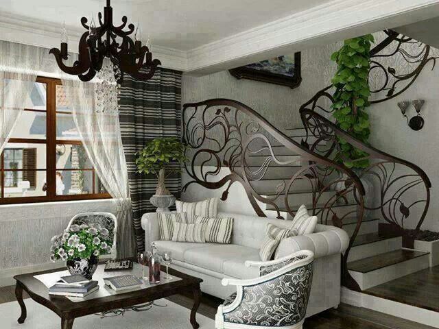 Stylish Design For Living Room Staircase The Home Pinterest This Room Shows The Art Nouveau Style Of Interior Design Uniquely Shaped Stair Rails Chandelier And Unusual Pillar Surrounded By Decorative Vines