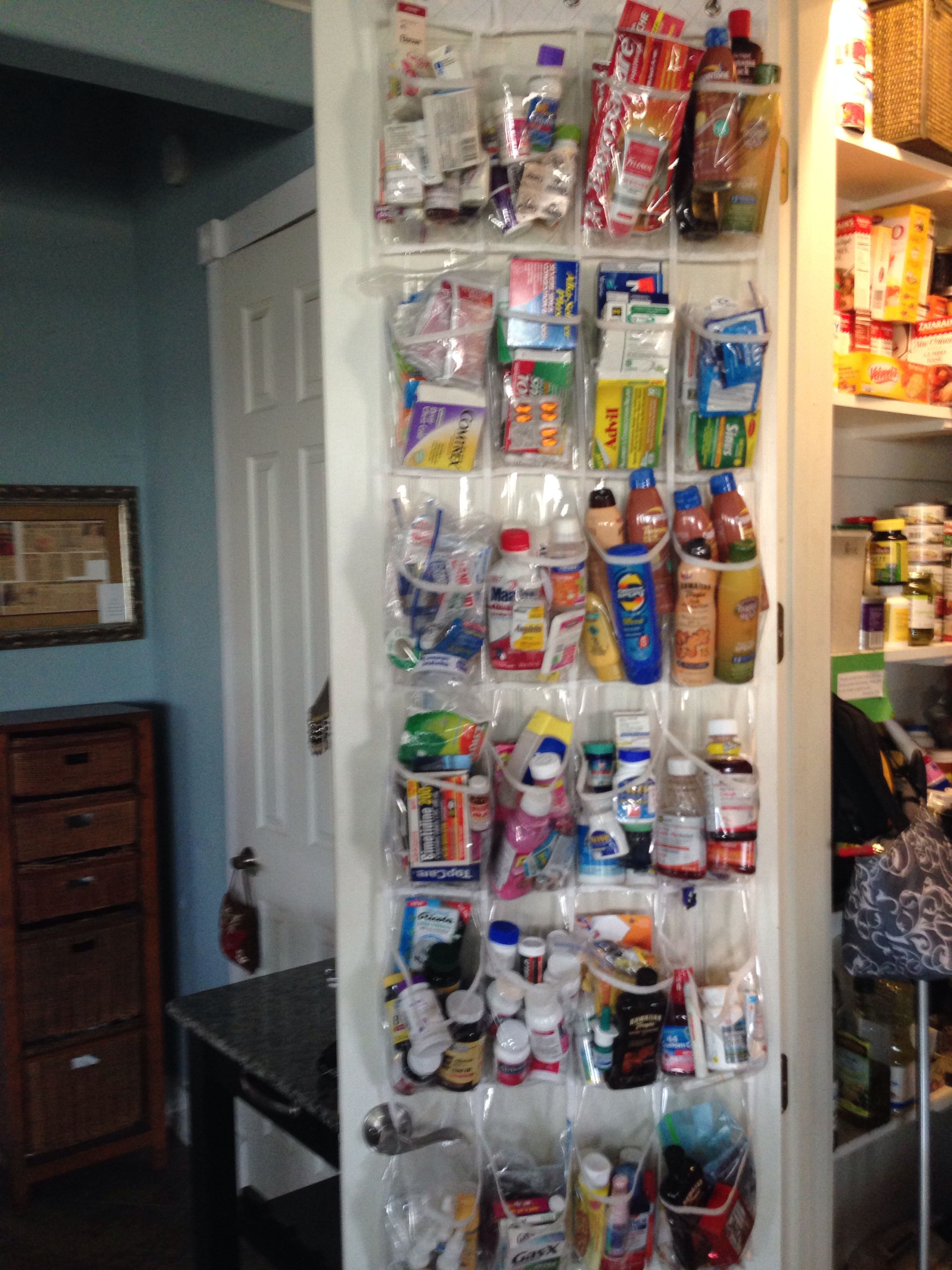 Show Holder used as a Medicine cabinet. Over the door in ...