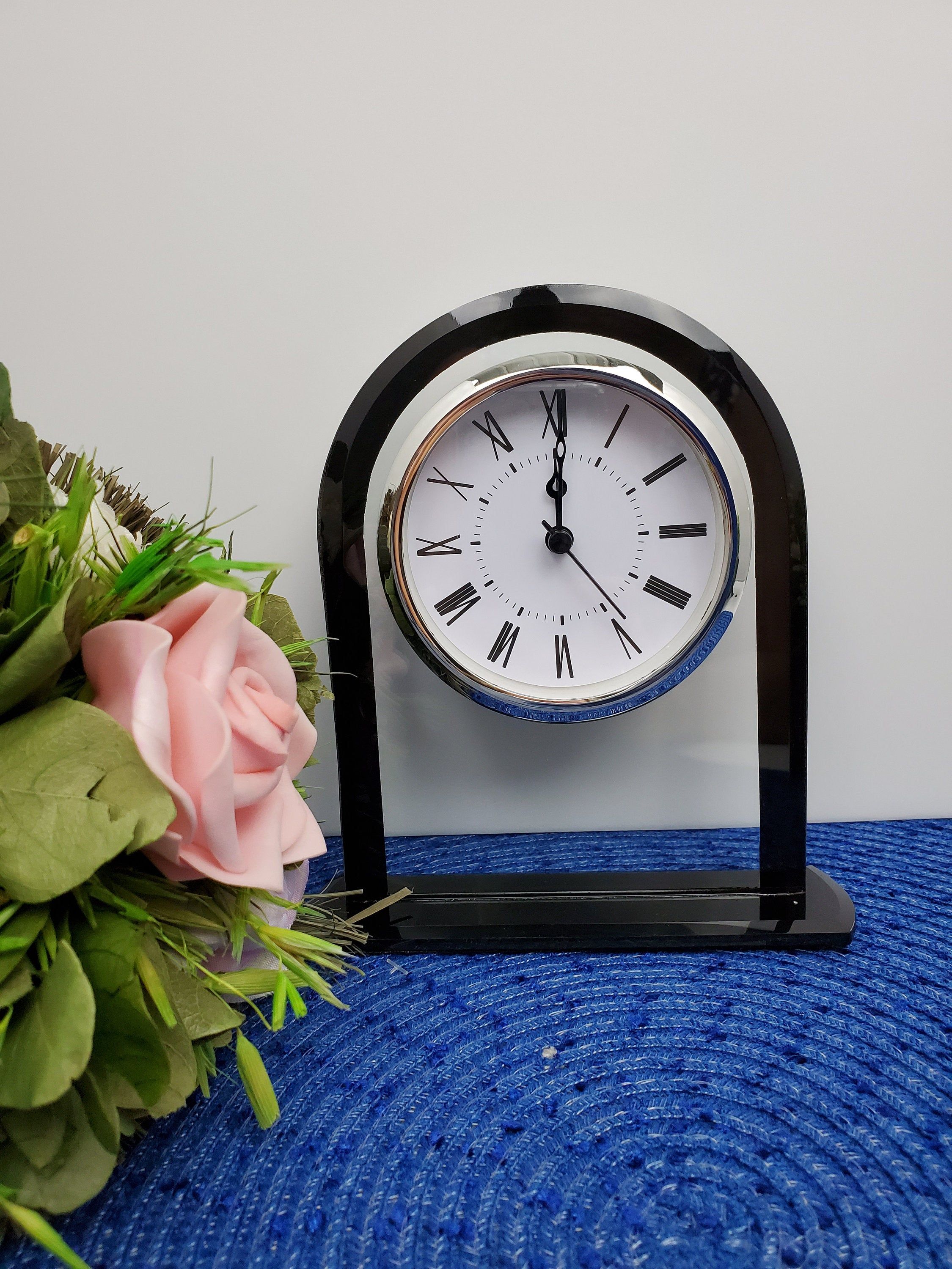 "Sleek Clear Glass Clock with Black Glass Accents. This arched top desk clock can be customized with a personalized engraved plate with your choice of wording. Feature an alarm and runs on AA battery (included). This quartz clock has white dial and black roman numerals and black hands. Add you personalize message and logo and it will be a gift to be treasured for a lifetime. Measures: 6 1/4\" x 5 1/2\" How to Order: Put engraving information in the \"Personalization Box\" Up to 3 Lines of Engrav Engraved Plates, Glass Desk, Desk Clock, Quartz Clock, Retirement Gifts, Black Accents, White Dial, Roman Numerals, Mantel Clock