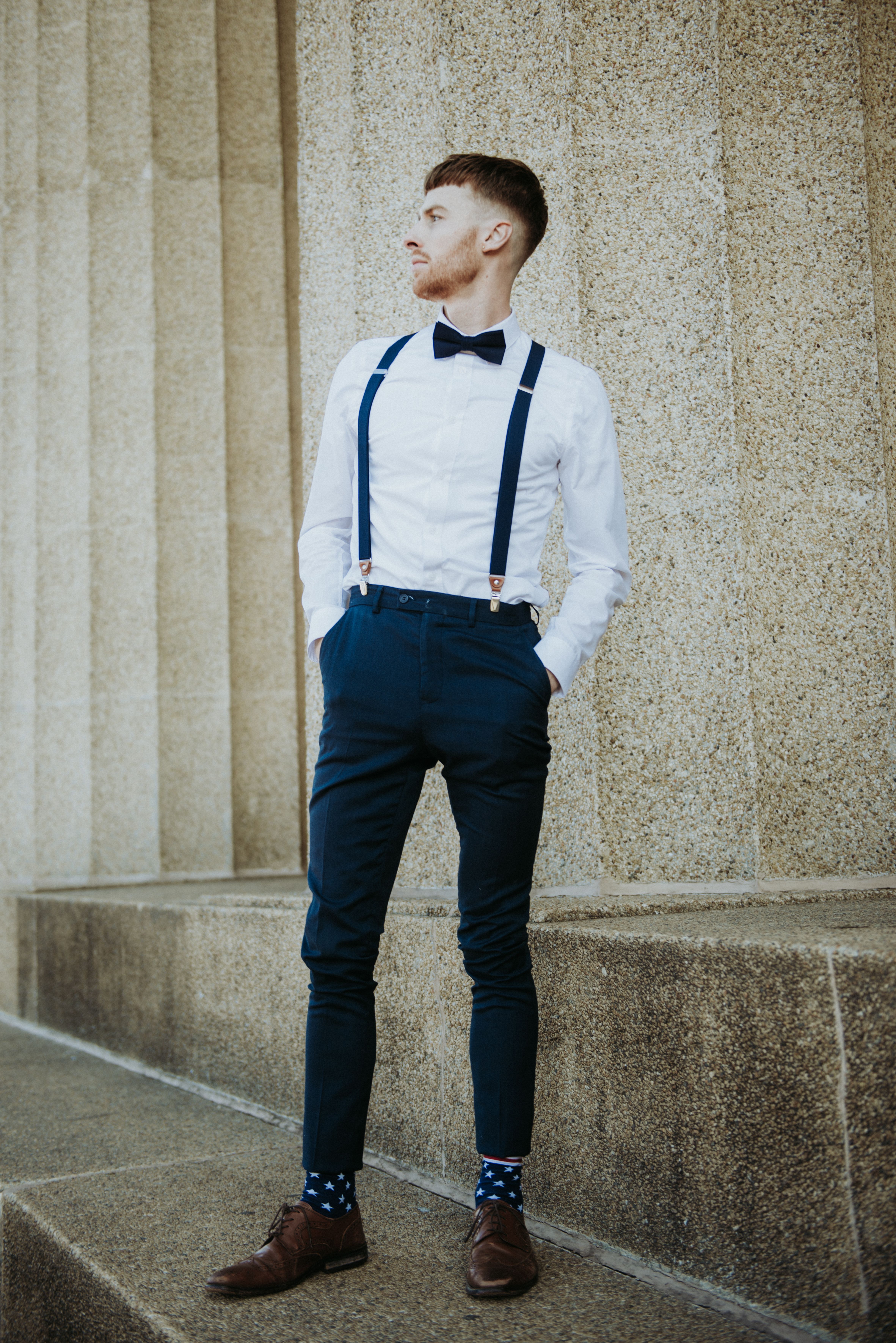 white dress shirt with suspenders