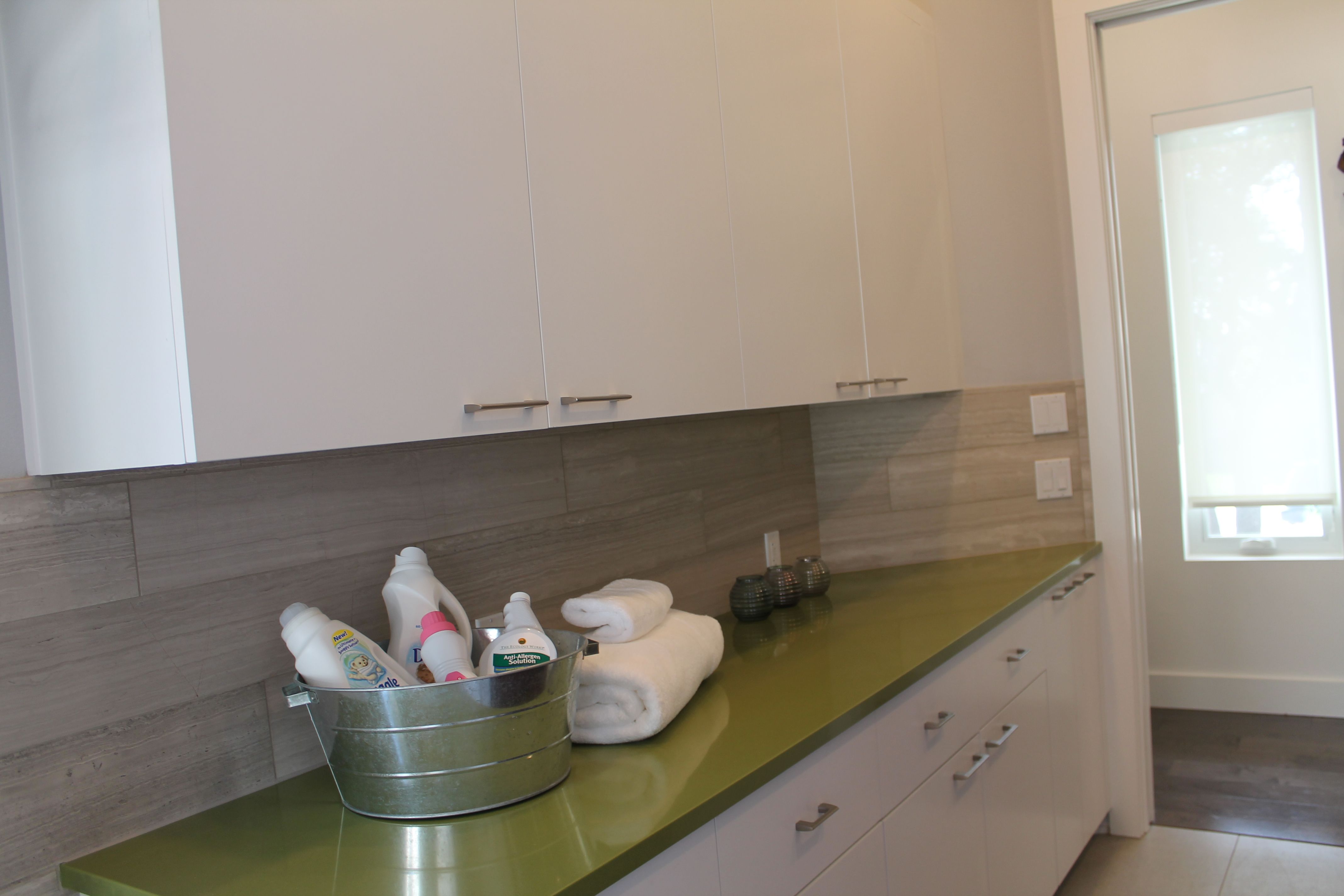 Hate the cupboards but the wood like tile backsplash it is great