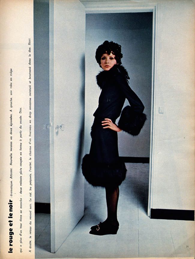 cathee dahmen wearing a black coat with black fox trims on collar hem cathee dahmen wearing a black coat with black fox trims on collar hem