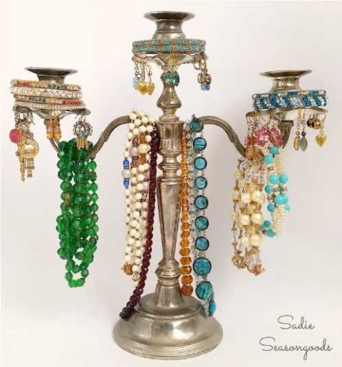 Convert that silver candelabra into a more useful jewelry tree. Drape necklaces over the arms, stack bracelets over the candleholders, and punch holes in the bobeches to hold pierced earrings. Diy Jewelry Holder Tree, Jewelry Tree Stand, Diy Jewelry Display, Earring Display, Jewellery Storage, Jewelry Organization, Jewelry Shop, Handmade Jewelry, Body Jewelry