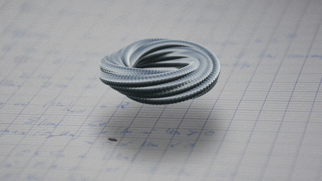 A Metal Object Sitting On Top Of A Wet Floor a-metal-object-sitting-on-top-of-a-wet-floor