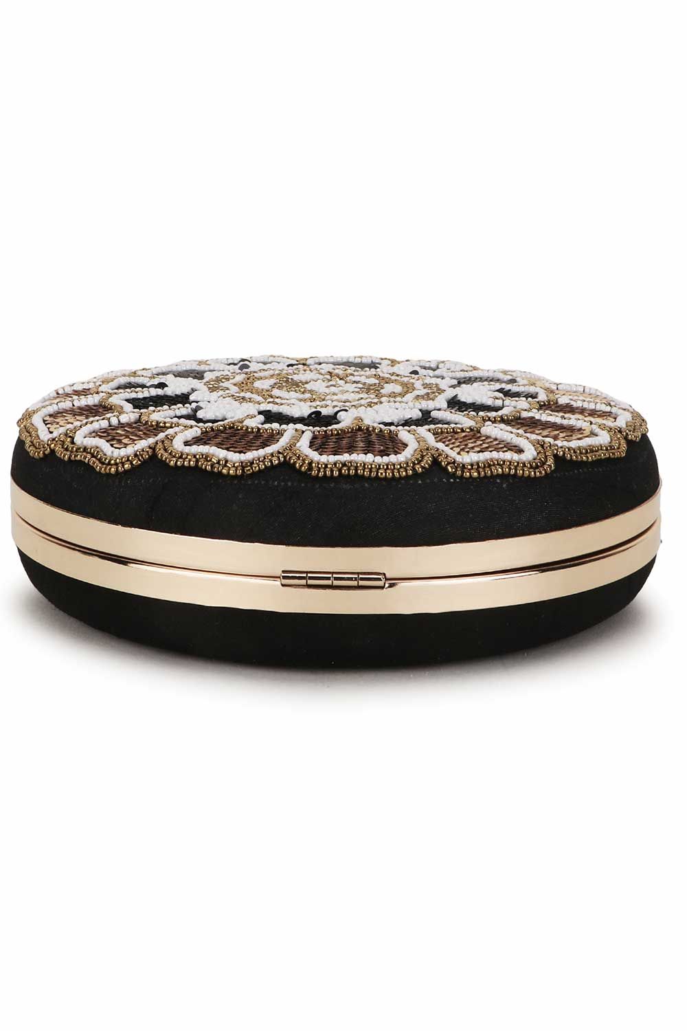 This Black & Gold Box Clutch comes with a spacious main compartment secured with a Click closure. It features a Floral Emroidered Pattern on Satin fabric and comes with a Detachable Shoulder strap along with a wrist loop. Product Features: Color: Black & Gold Fabric: Faux Silk Pattern: Floral Emroidered Style: Floral Emroidered Clutch with Click Closure Surface Style: Buckle Detail Strap / Handle: Shoulder strap Strap Adjustable: Non-Adujstable Strap Detachable: Detachable Shape: Round Care: Wip Gold Fabric, Satin Fabric, Emroidered, Box Clutch, Gold Box, Wip, Black Gold, Compartment, Spacious