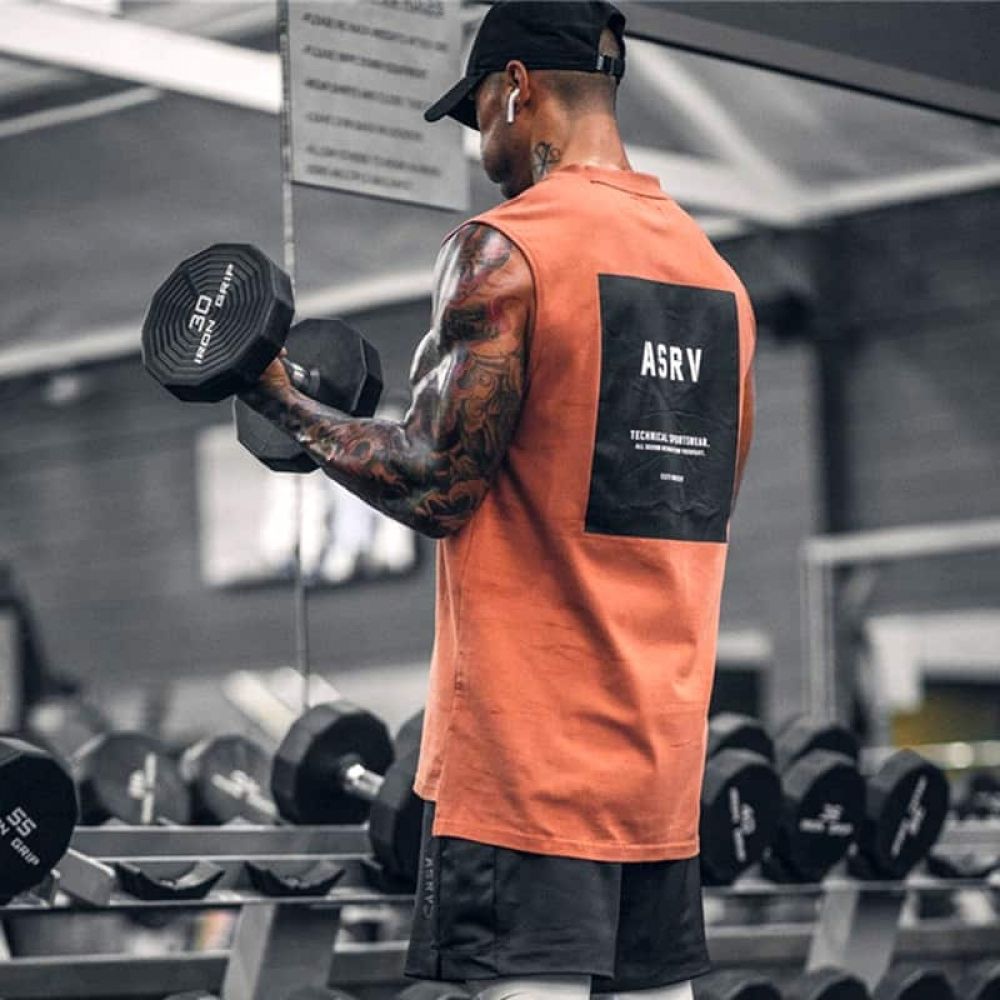 Gym Workout Sleeveless Tank Top Men Price: 27.00 & FREE Shipping Mens Workout Tank Tops, Workout Vest, Gym Tank Tops, Workout Tanks, Gym Workouts, Mens Tank Tops, Gym Photography, Activewear Photography, Mens Fitness Photography