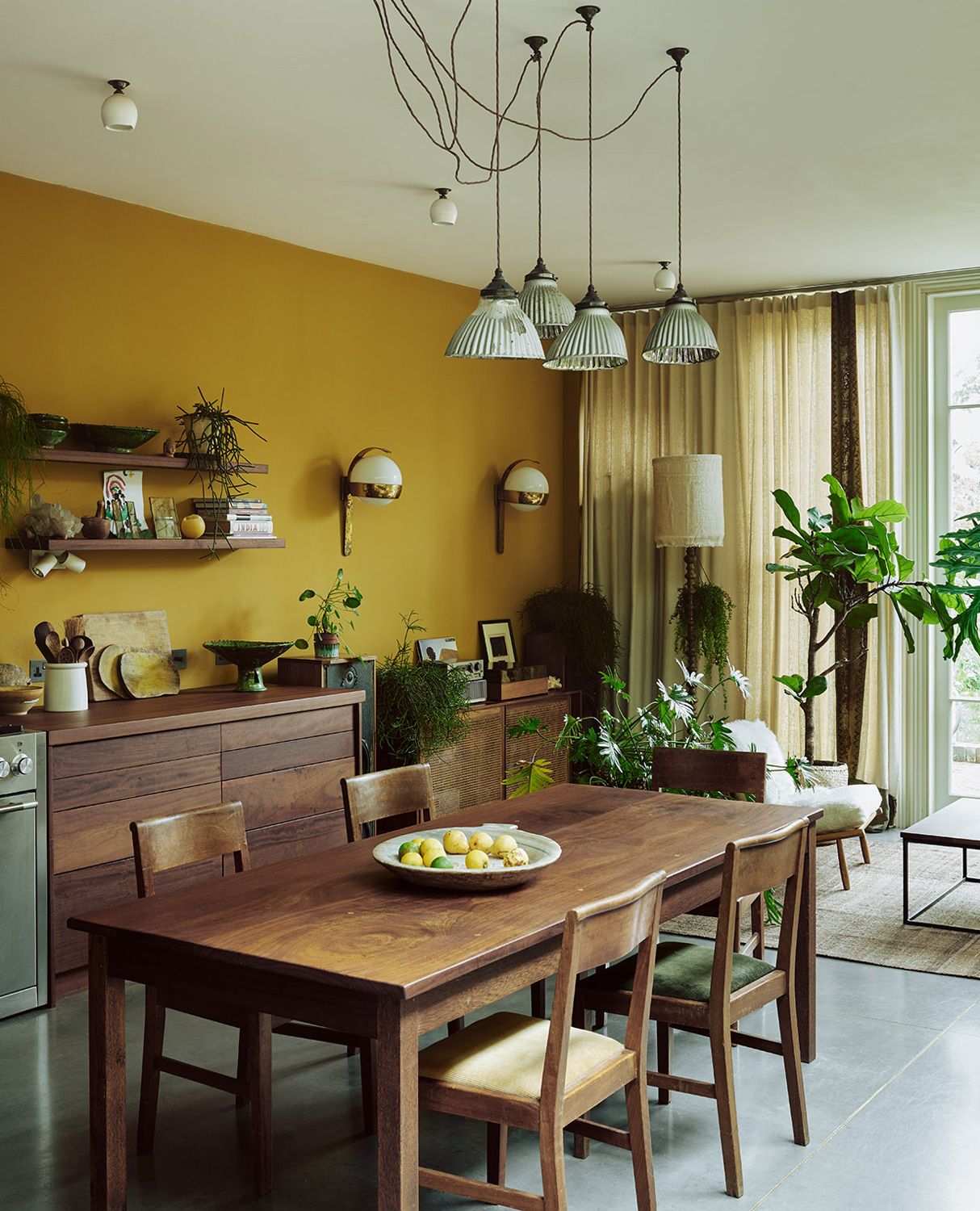 Kitchen with recycled wooden and mustard yellow wall in 2021