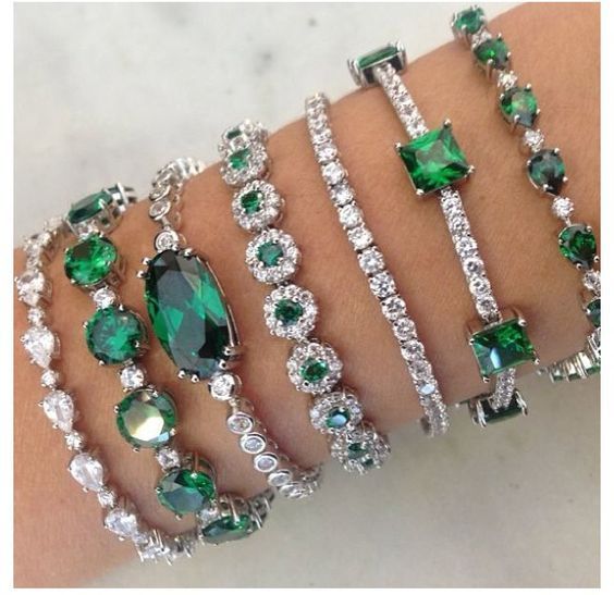Emeralds diamonds. I don’t normally love emeralds, but…these bracelets