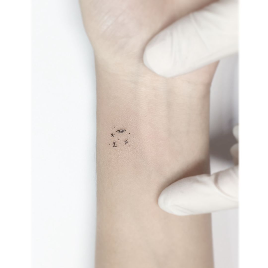 Little Universe By Jakub Nowicz Planet Tattoos Line Tattoos Small Tattoos