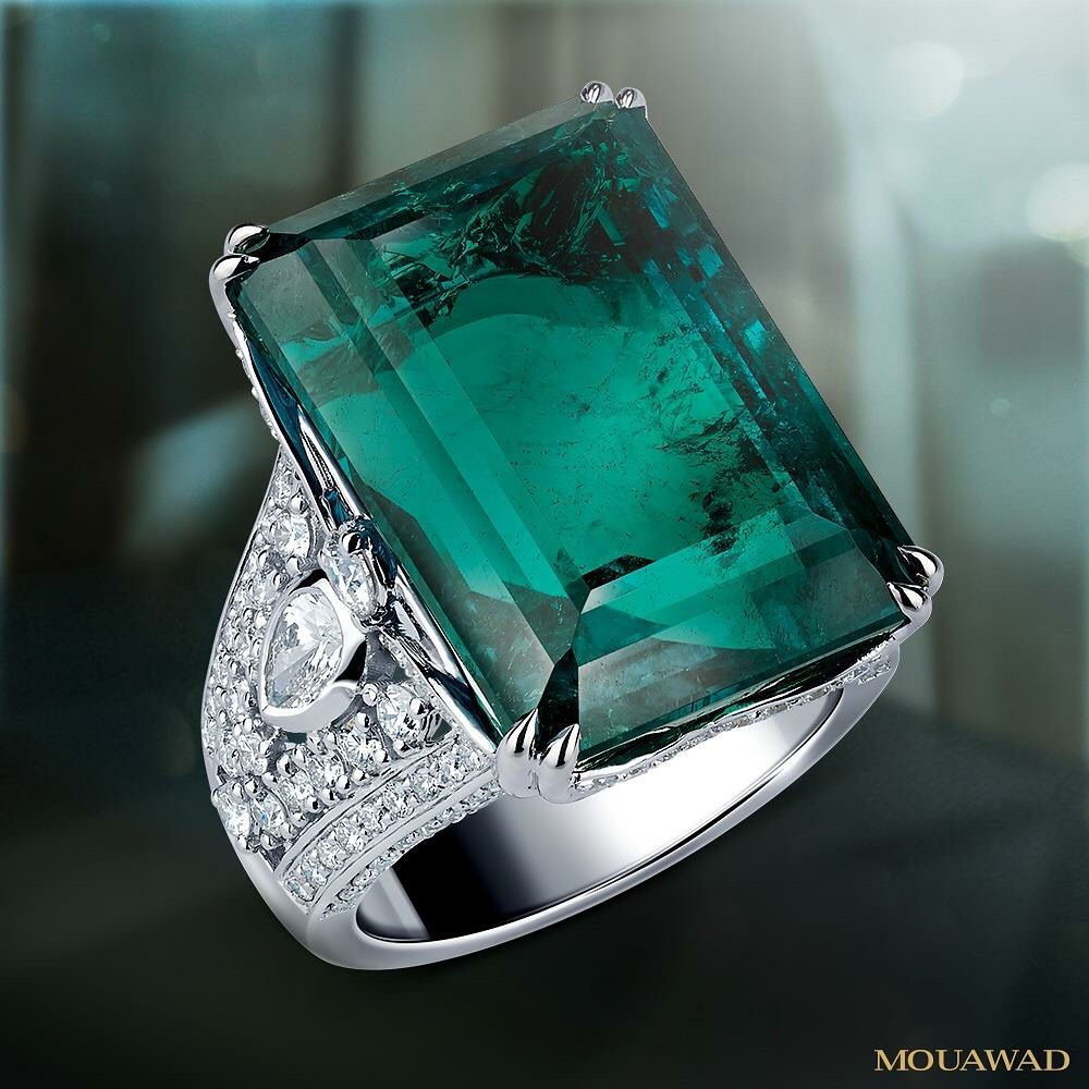 A Octagonal Vivid Green Columbia Emerald Ring By Mouawad Diamond High Jewelry