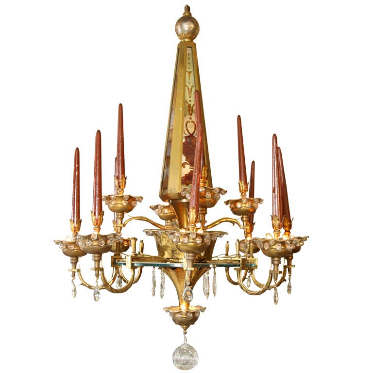 Gilt Metal Verre Eglomise Chandelier By Maison Bagues The Gilt Metal Verre Eglomise Chandelier By Maison Bagues The Obelisk Stem Hangs Above 2 Tiers Of 12 Scrolling Arms Embellished With Glass Beads