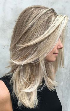 When you want a versatile look that falls in the sweet spot between short and long, the medium-length cut is the just-right style you've been waiting for. Since it lives somewhere in the center of the hair spectrum, the mid-length cut gets flack at times for seeming more hum-drum than wham-bam. But we think it’s time to give it some credit. It’s not reserved for those so undecided about the right haircut that they settle for an in-between. Rather, it's gloriously endless in options when it comes Medium Hair Cuts, Long Hair Cuts, Medium Length Hair Styles, Thick Hair Styles, Mid Length Hair With Layers, Medium Long Length Haircut Straight, Medium Hair With Layers, Hair Cuts For Summer, Hair Cuts For Moms