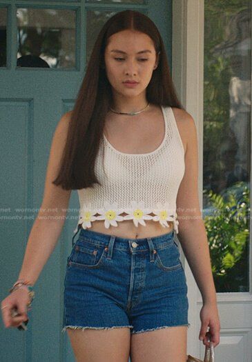 Belly’s white floral crochet top and denim shorts on The Summer I