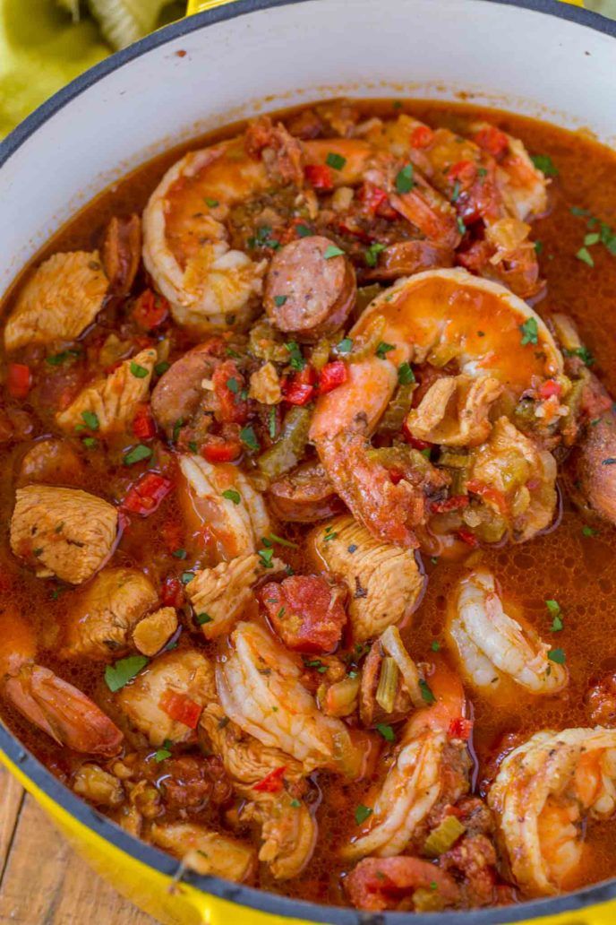 Easy Jambalaya made with Chicken, Shrimp and Andouille Sausage in under 45 minutes. Served over rice or rice cooked with the jambalaya for one pot meal. | #jambalaya #cajun #cajunrecipes #dinnerthendesert #onepot #easyrecipes #stew #shrimp #sausage #chicken #dinner #weeknight #quickrecipes Jambalaya Recipe Easy, Seafood Gumbo Recipe Easy, Seafood Rice, Seafood Boil, Cajun Dishes, Shrimp Dishes, Slow Cooker Jambalaya, Cajun Jambalaya, One Pot Dinners