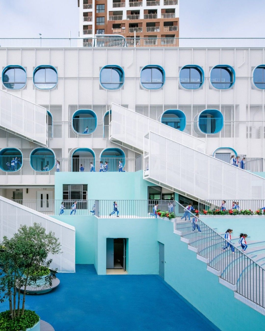 Vivid shades of blue and turquoise characterise this school in Shenzhen, China, which has been overhauled by People's Architecture Office. University Architecture, Open Architecture, Chinese Architecture, School Architecture, Architecture Project, Modular Housing System, Outdoor Learning Spaces, Shopping In Barcelona, Teen Stores