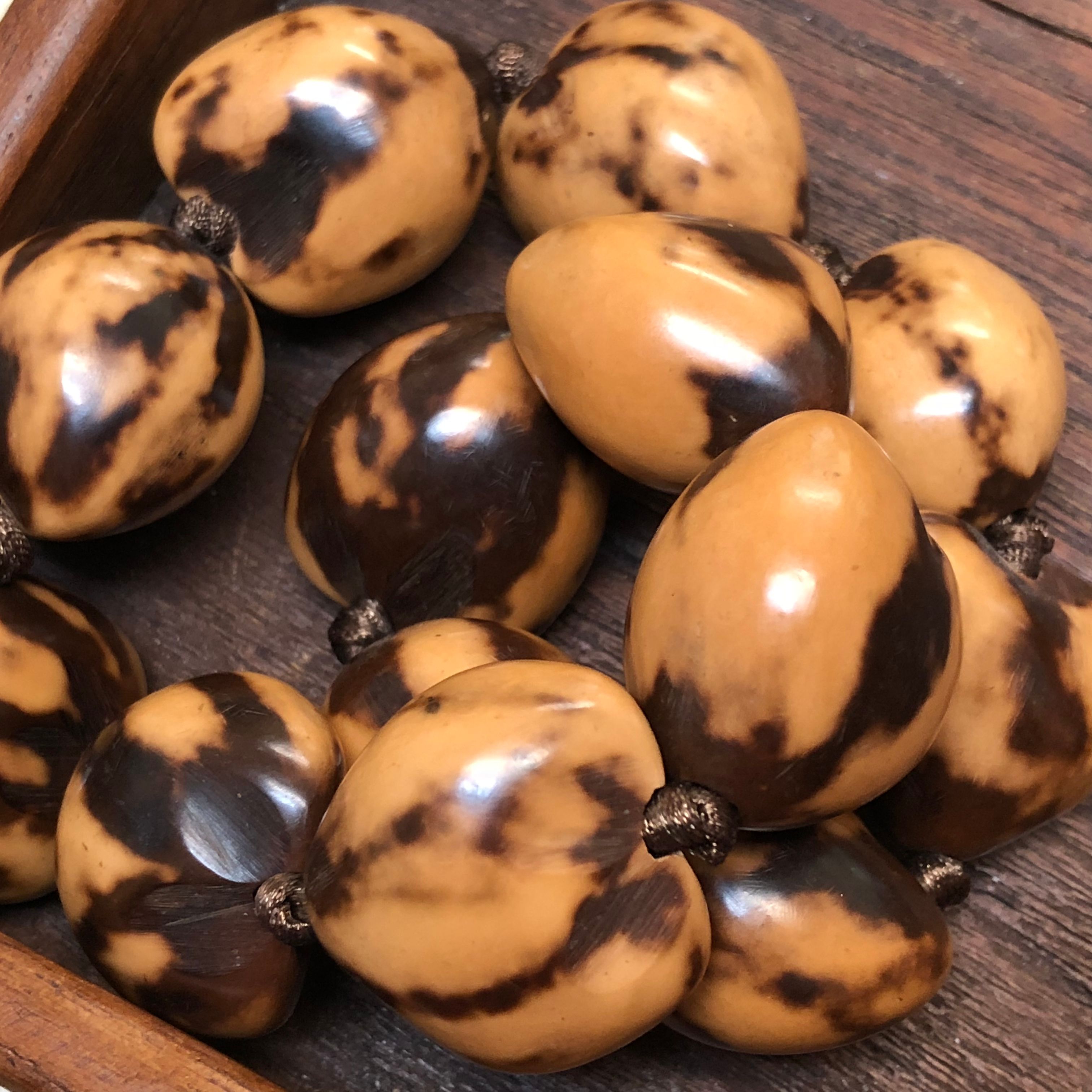 Lovely Kukui Nut (candlenut) beads! Such pretty patterns on these, and