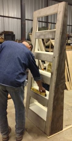 Checking level on old door shelf More Old Door Projects, Furniture Projects, Furniture Makeover, Home Projects, Diy Furniture, Furniture Outlet, Furniture Plans, Recycled Door, Doors Repurposed