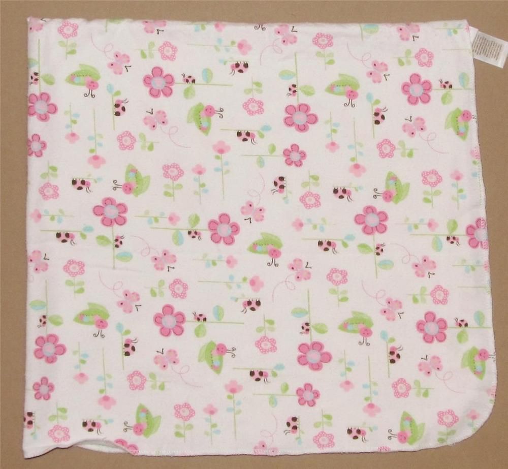 cream pram blanket with colourful butterfly
