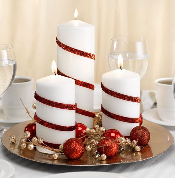 The eye catching color combination of red and white is an instant way to brighten a room in preparation for the Christmas season. From our trees and our tables to our sofas and chairs, adding accen... Christmas Wedding Centerpieces, Christmas Centrepiece Ideas, Christmas Table Centerpieces, White Christmas Decor, Noel Christmas, Christmas Candles, Simple Christmas, All Things Christmas, Winter Christmas