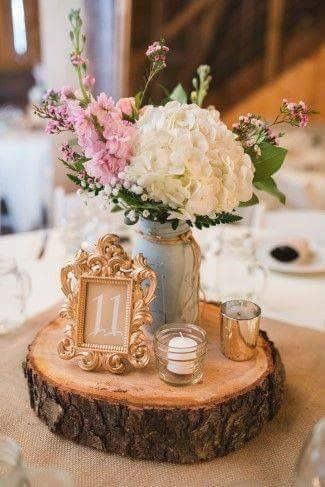 Wedding Reception Center Piece On A Wood Slab With Gold Frame For Table Number And White Hydrangeas Vintage Decor Wedding Reception Center Piece On A Wood Slab With Gold Frame For Table Number And White Hydrangeas Vintage Decor